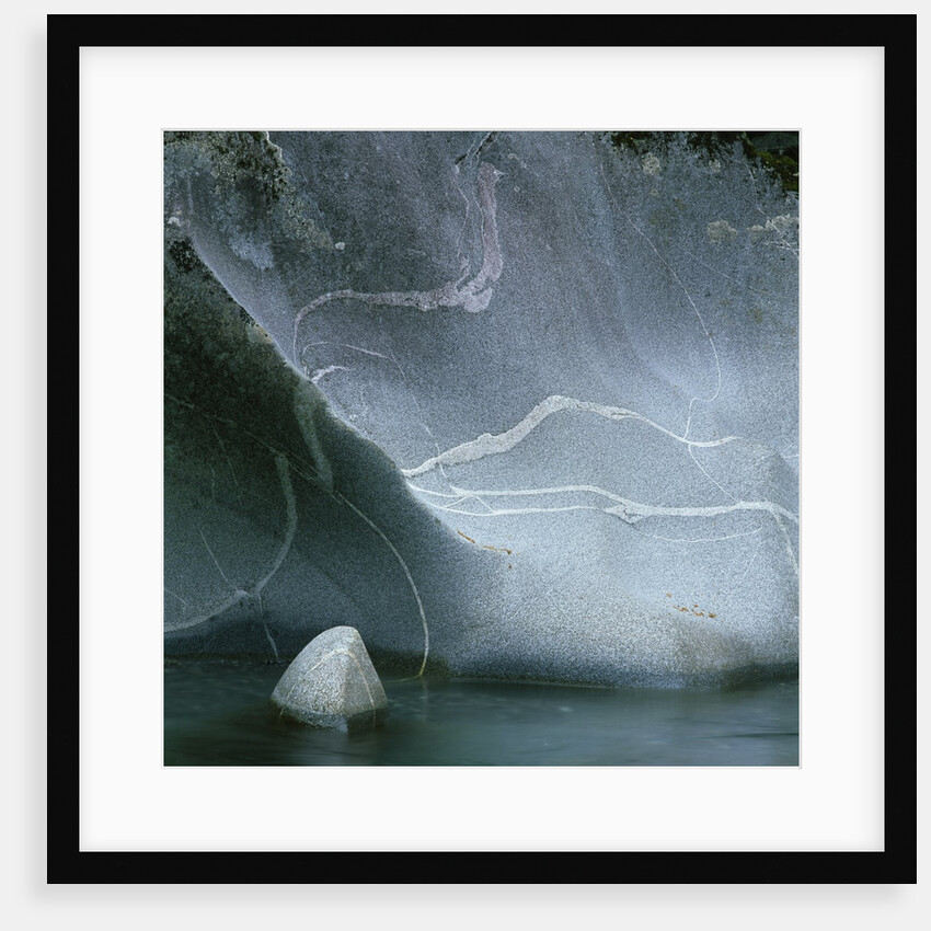 Strata in Riverbank Rock Formation by Anonymous