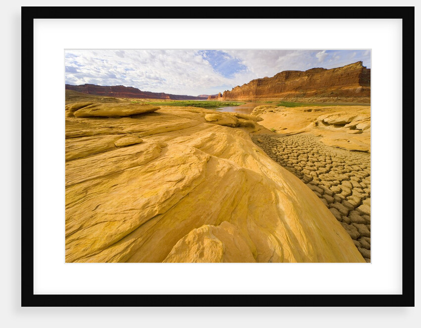Sandstone Formation and Cracked Silt Deposits by Anonymous