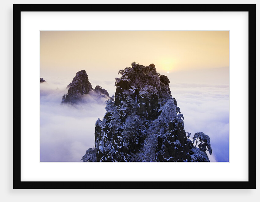 Mountain Peaks Above Clouds by Anonymous