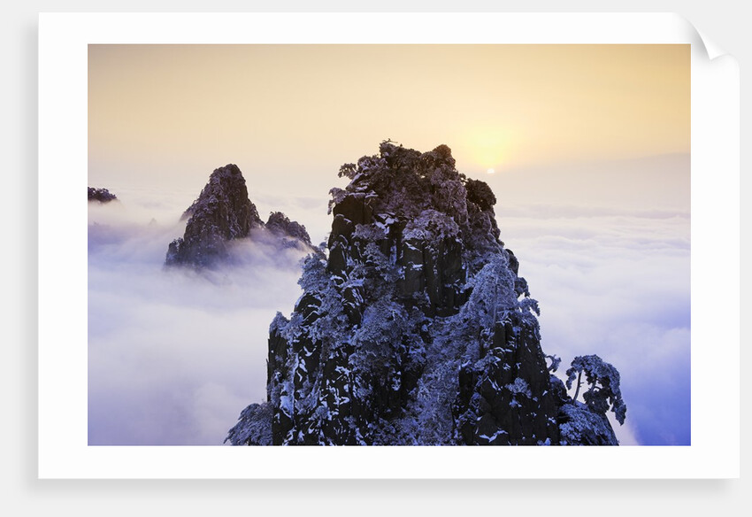 Mountain Peaks Above Clouds by Anonymous