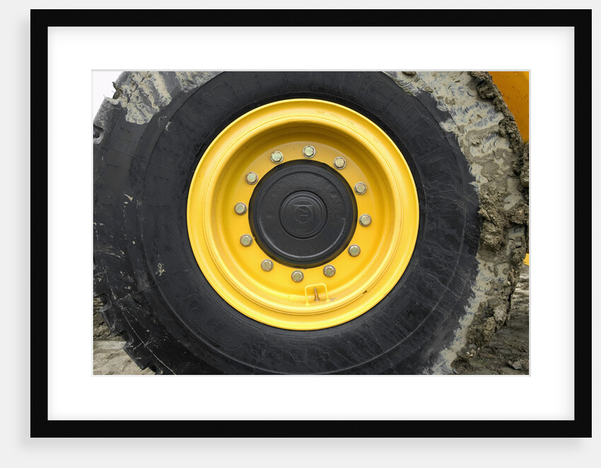 Muddy Tire on Bulldozer by Anonymous