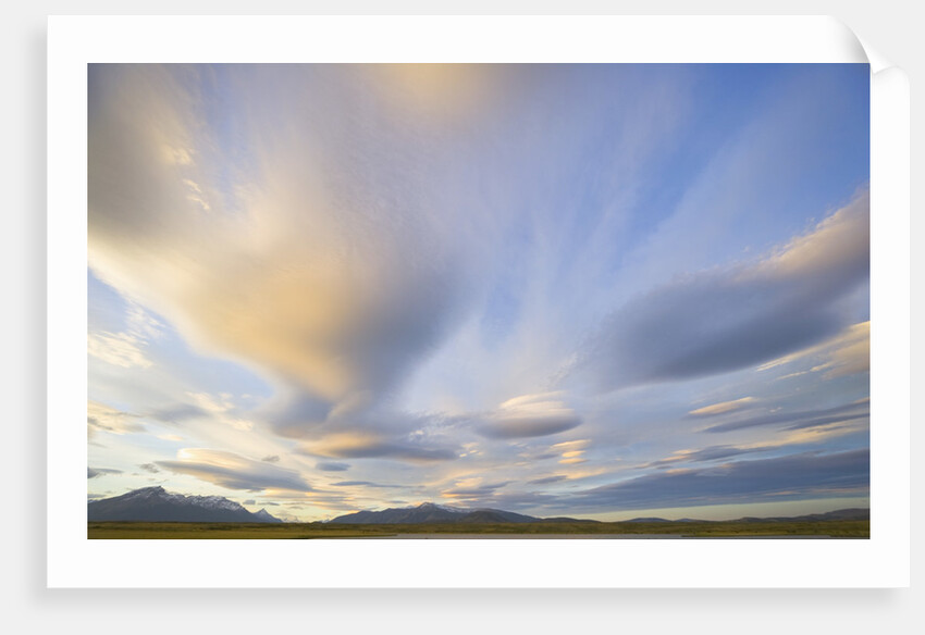 Wavy Lenticular Clouds Over Mountains by Anonymous