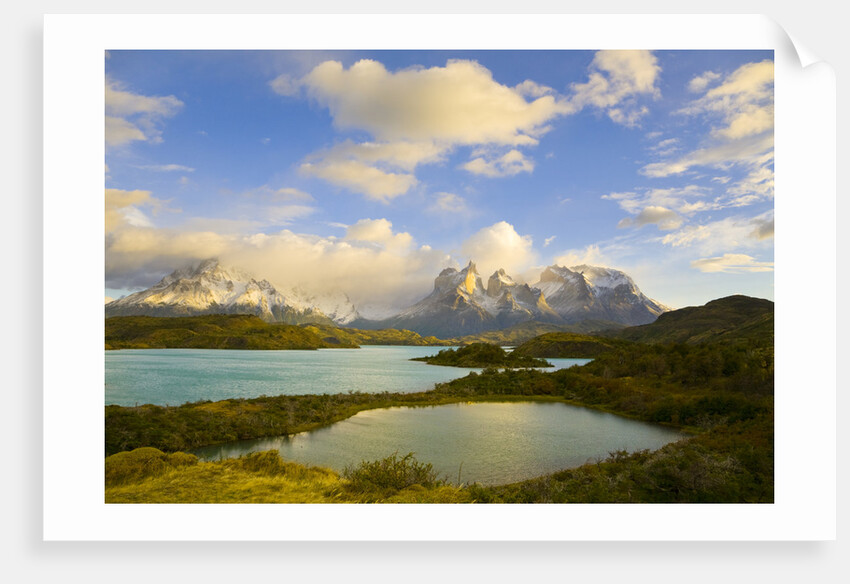 Mountains Shrouded in Clouds near Lake by Anonymous
