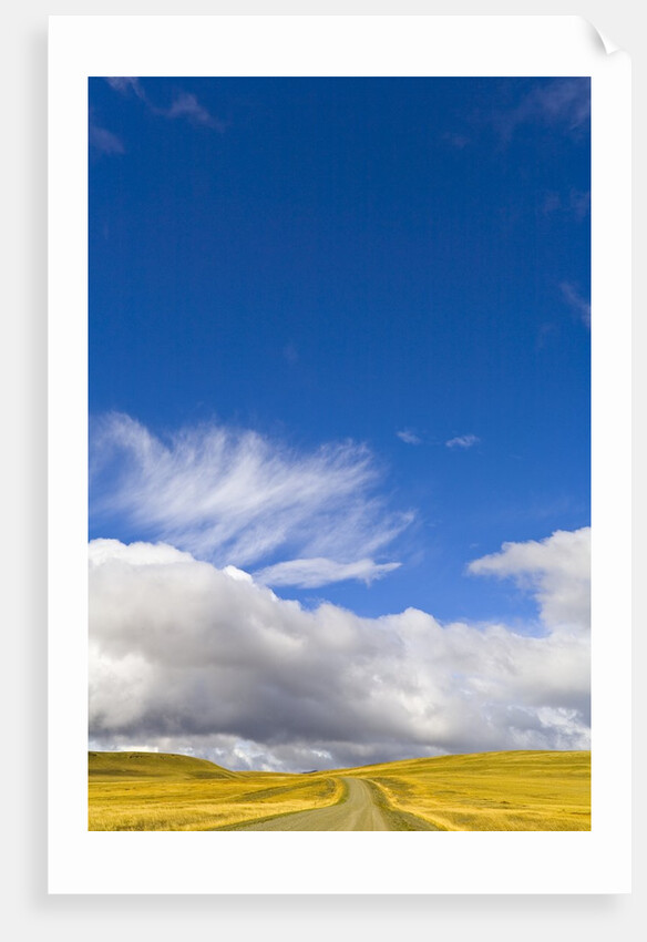Clouds above Rural Road by Anonymous