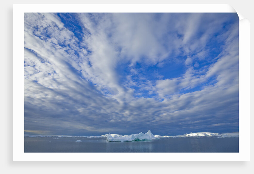 Clouds Above Sea and Snow-covered Coast by Anonymous