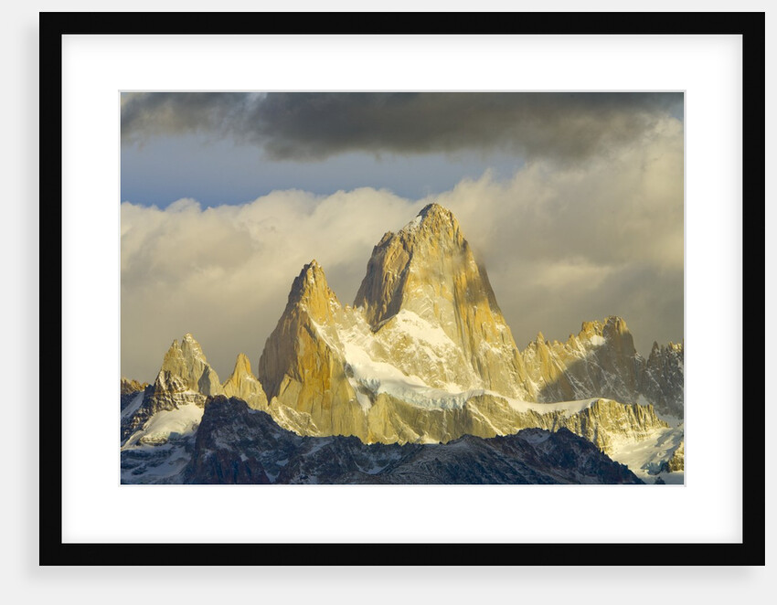 Fitzroy Massif and Cumulus Clouds at Sunrise by Anonymous