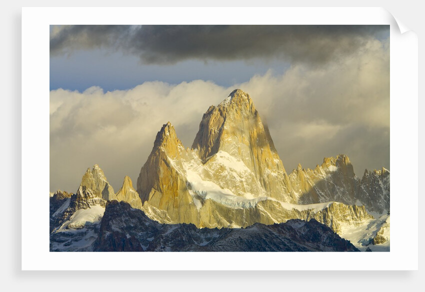 Fitzroy Massif and Cumulus Clouds at Sunrise by Anonymous