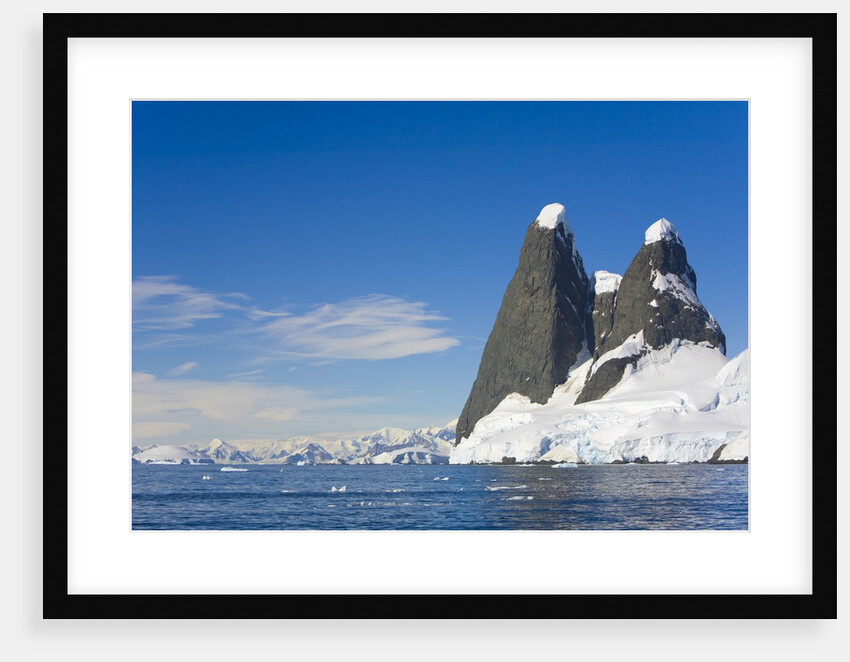 Snowcapped Pinnacles on Coast by Anonymous
