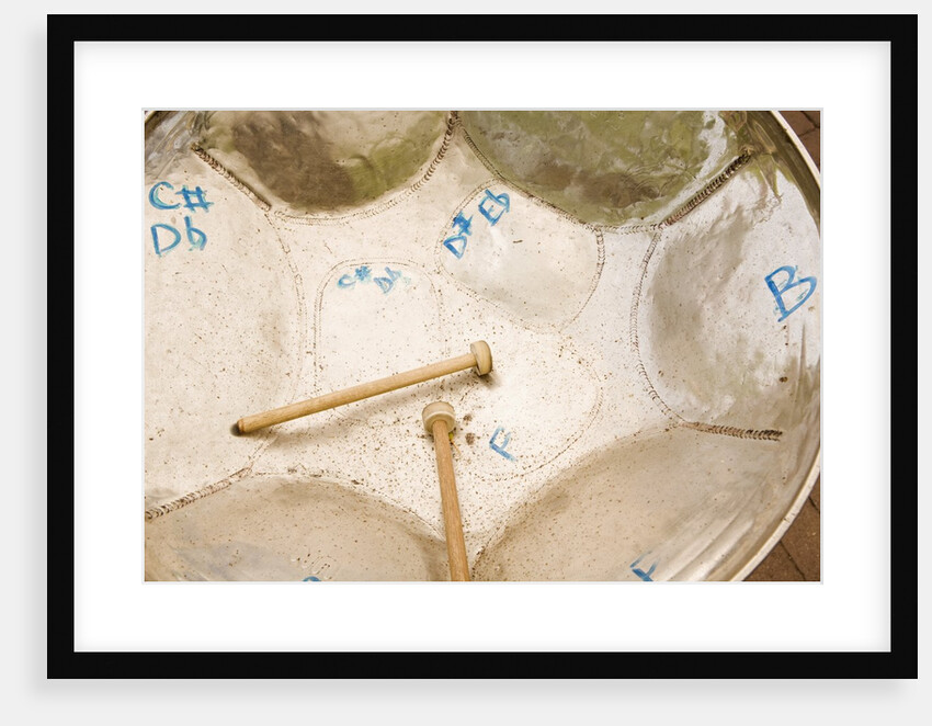 Steel Drum and Drumsticks by Anonymous