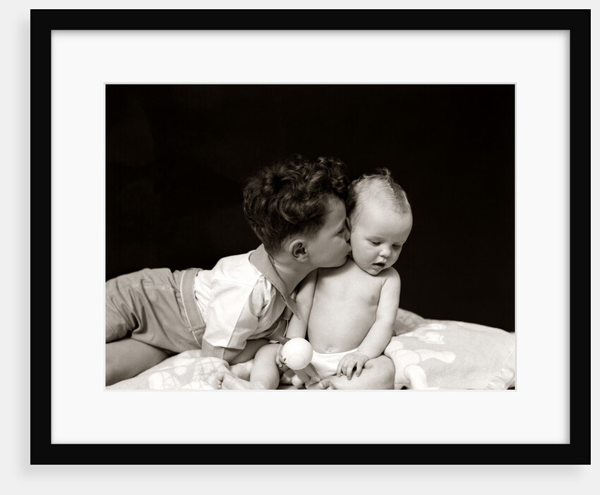 1940s Curly Haired Boy Toddler Leaning And Kissing Cute Baby by Anonymous