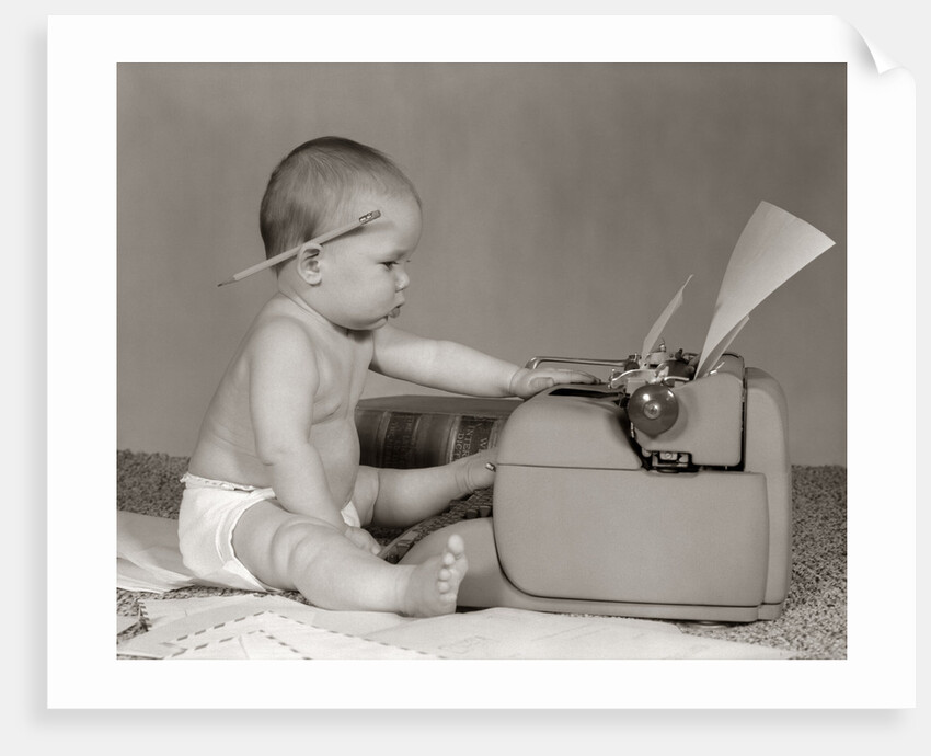 1960s Businesslike Baby With Pencil Behind Ear Typing On Typewriter by Anonymous