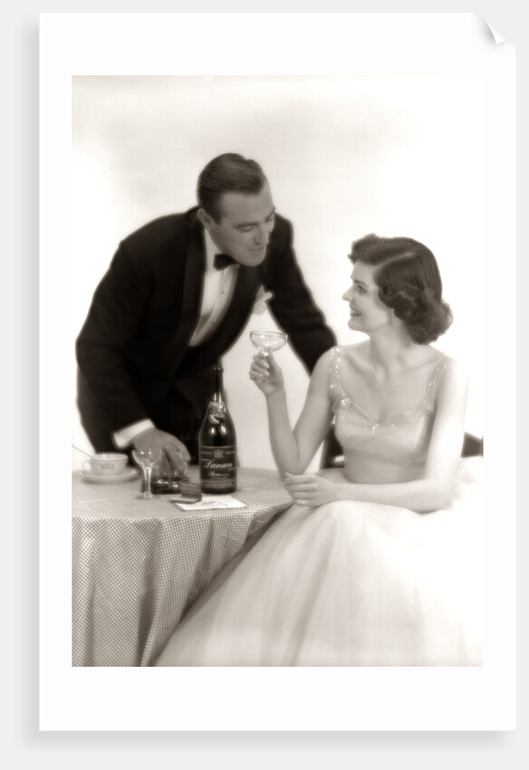 1950s Formal Dress Couple Man In Tuxedo Woman Wearing Gown Holding Champagne Glass by Anonymous