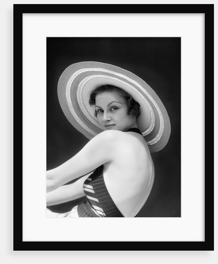 1930s Woman Wearing Halter Top and Straw Hat by Anonymous