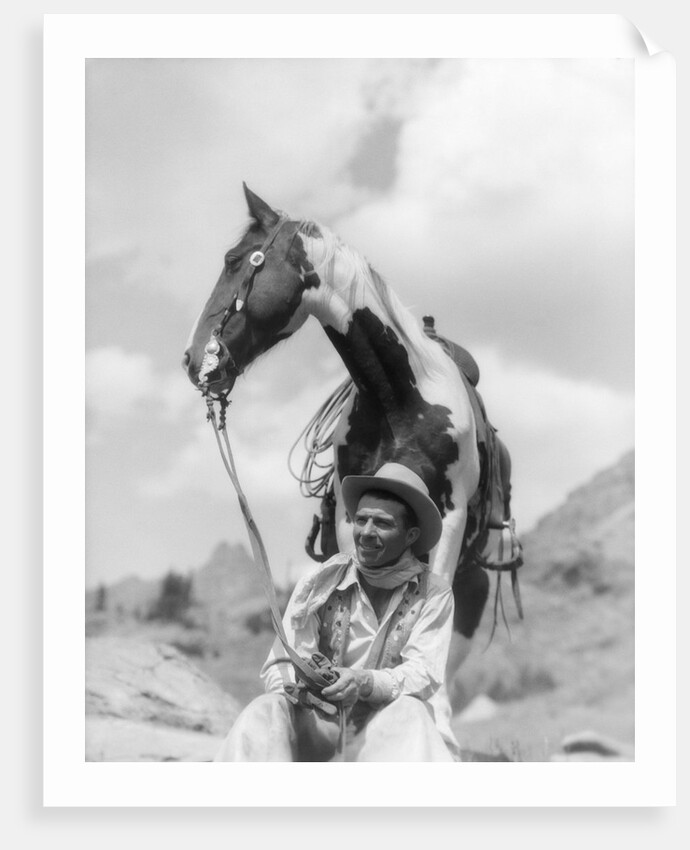 1930s Cowboy Sitting In Front Of Horse Holding Reins Spotted Paint Pinto by Anonymous