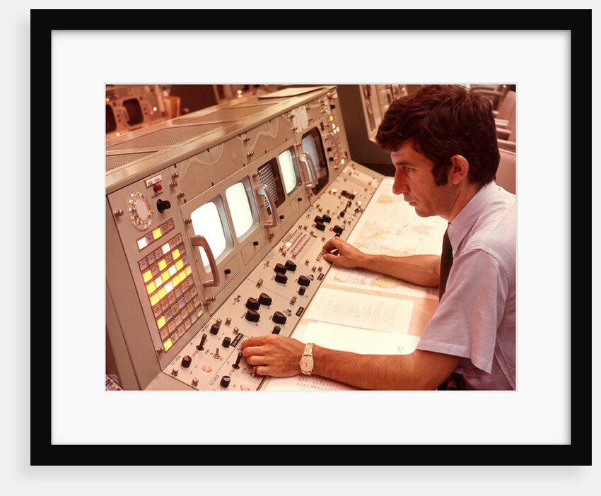 1970s Man Sitting At Control Panel Of NASA Mission Control by Anonymous
