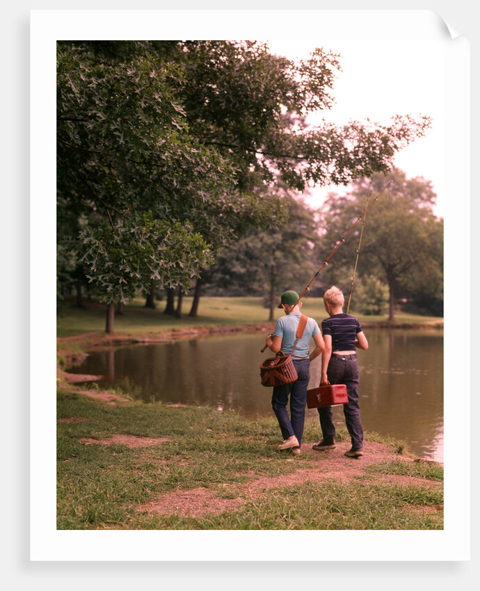 1970s 1960s Two Boys Walking Beside Fishing Pond by Anonymous