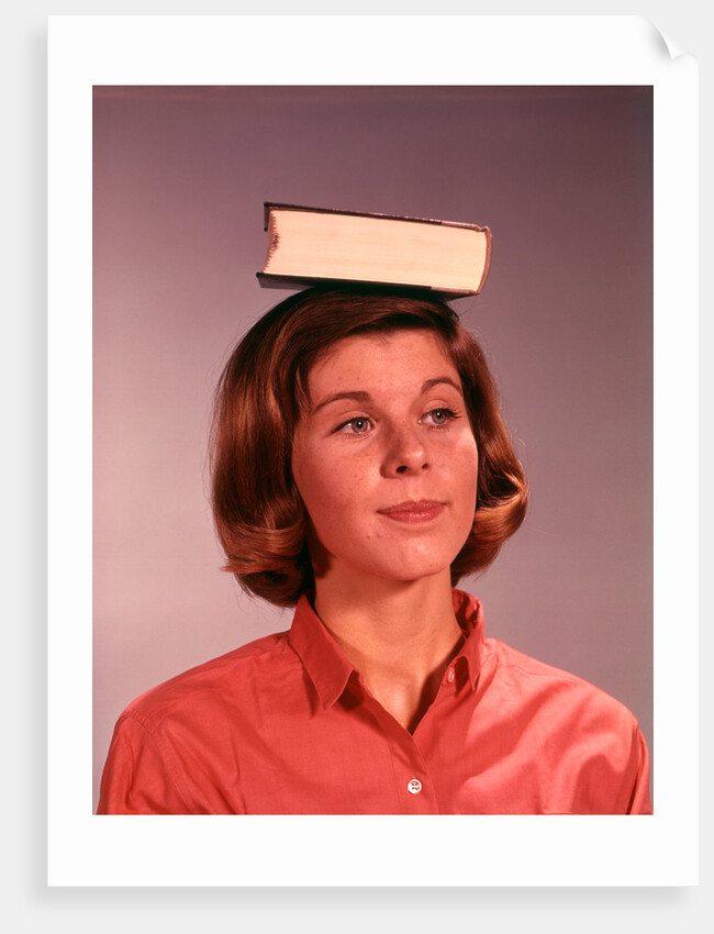 1960s 1970s Young Woman Girl Balancing Book On Head by Anonymous