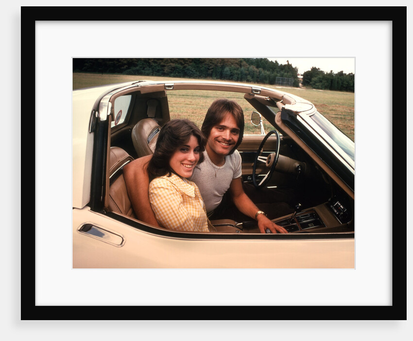 1970s Young Couple Man Woman Sitting Cockpit Of Chevrolet Corvette Car Sports by Anonymous