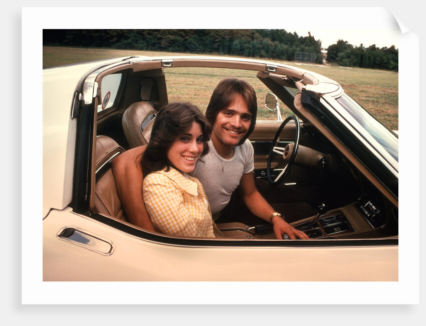 1970s Young Couple Man Woman Sitting Cockpit Of Chevrolet Corvette Car Sports by Anonymous