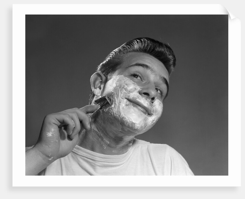1950s Young Man Shaving With Safety Razor by Anonymous