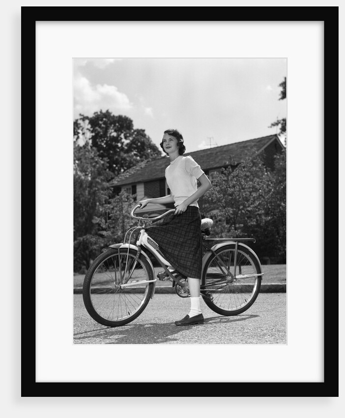 1950s Teen Girl Standing With Bike by Anonymous