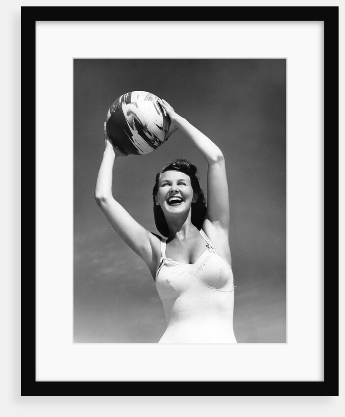 1940s Woman In White Bathing Suit Holding A Beach Ball Over Her Head Outdoor by Anonymous