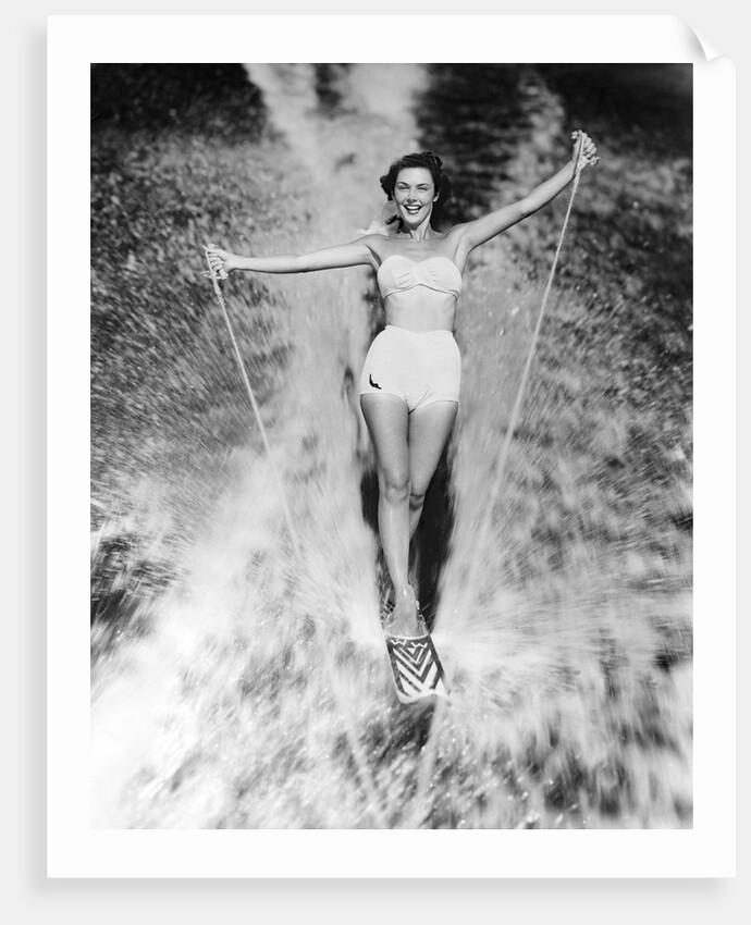 1950s Woman In Two Piece Bathing Suit Aquaplaning Water Skiing by Anonymous