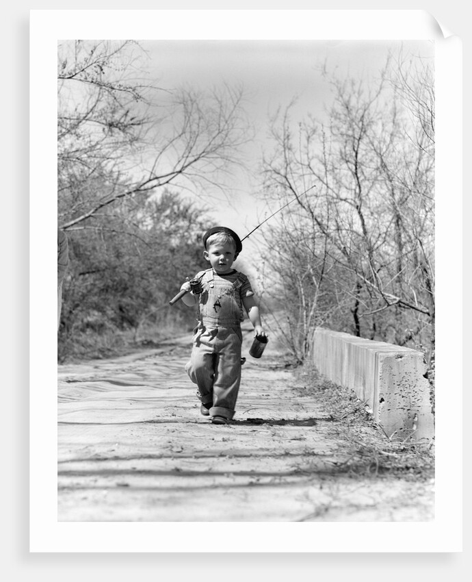 1940s Boy Walking Down Country Road With Can Of Worms And Fishing Pole by Anonymous