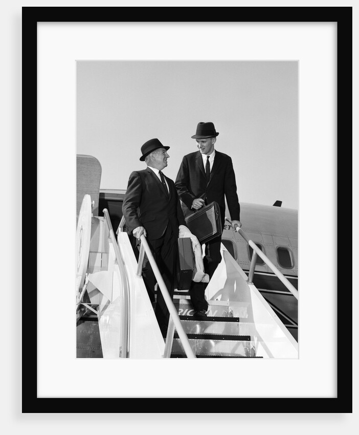 1960s Two Business Men Briefcase Exit Airplane Steps by Anonymous