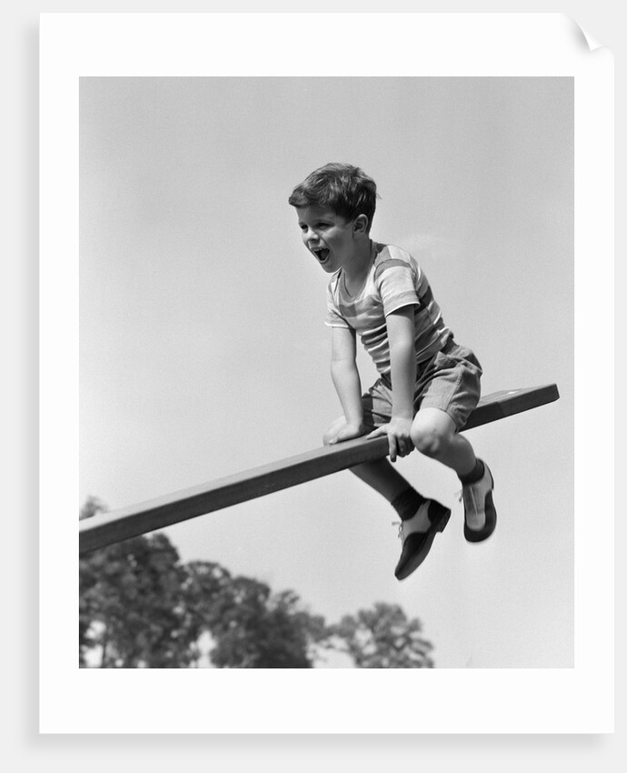 1930s 1940s Excited Boy On Seesaw Playing by Anonymous