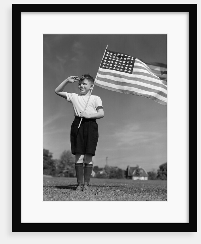 1940s Boy Holding American Flag Saluting Wearing Short Pants by Anonymous