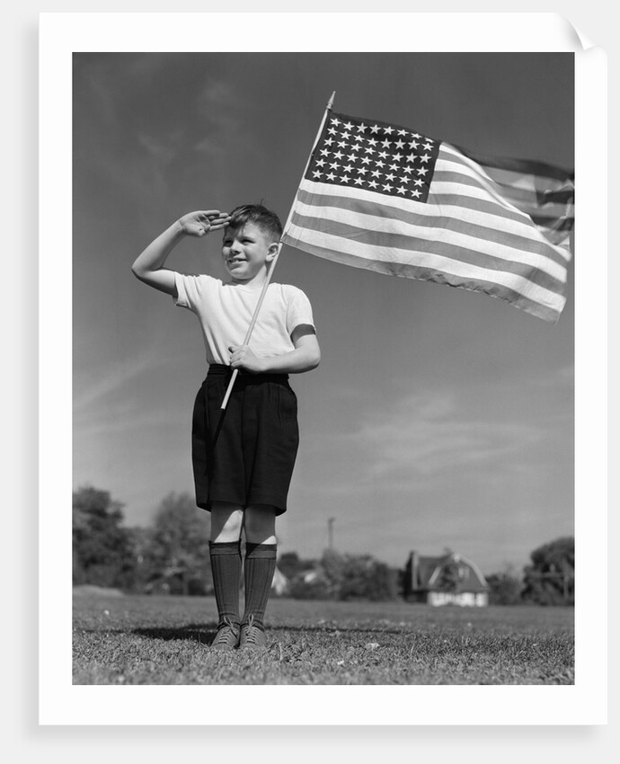 1940s Boy Holding American Flag Saluting Wearing Short Pants by Anonymous