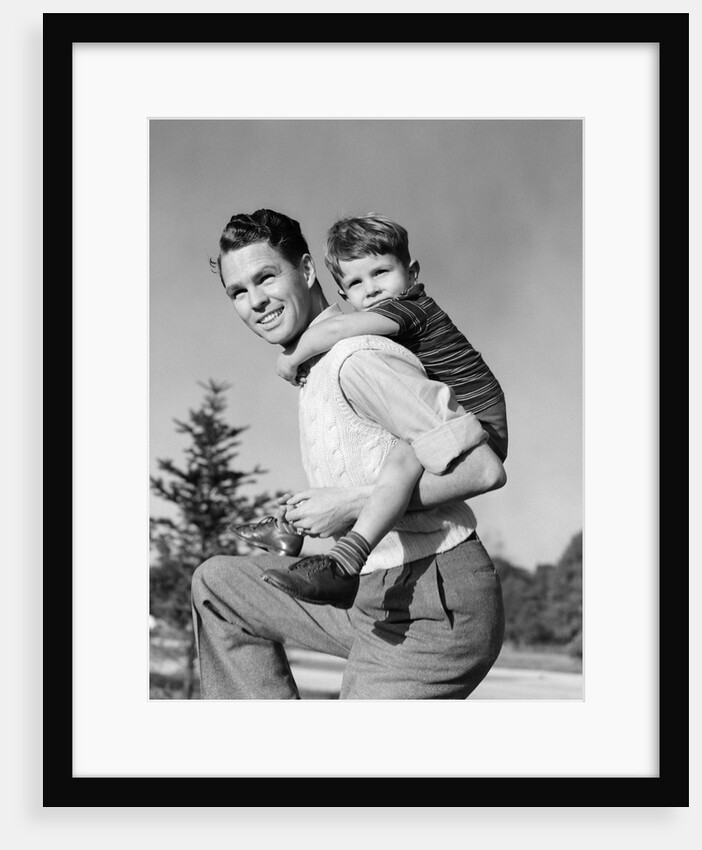 1940s Father Carrying Son Piggyback On Back by Anonymous