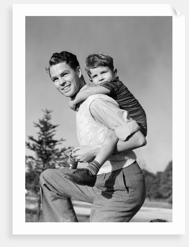 1940s Father Carrying Son Piggyback On Back by Anonymous