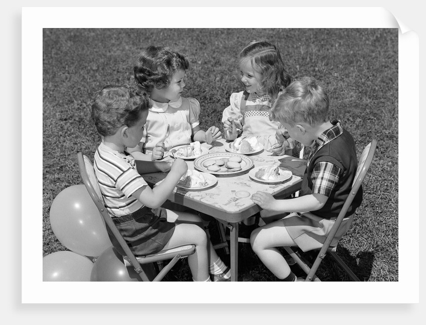 1950s Boys and Girls At Table Eating Cookies and Ice Cream For Birthday Party by Anonymous