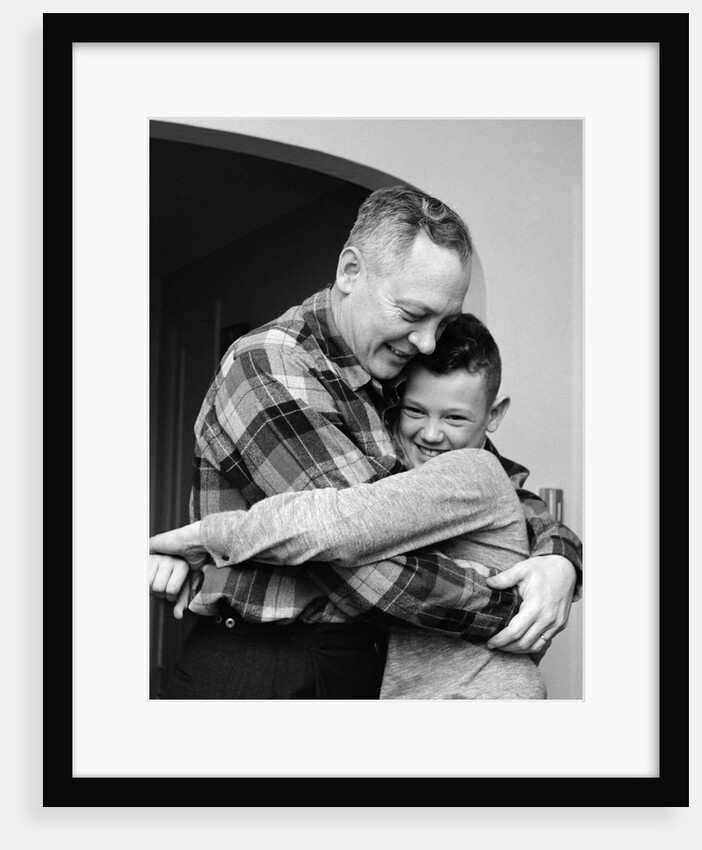 1950s 1960s Father And Son Hugging Indoor by Anonymous