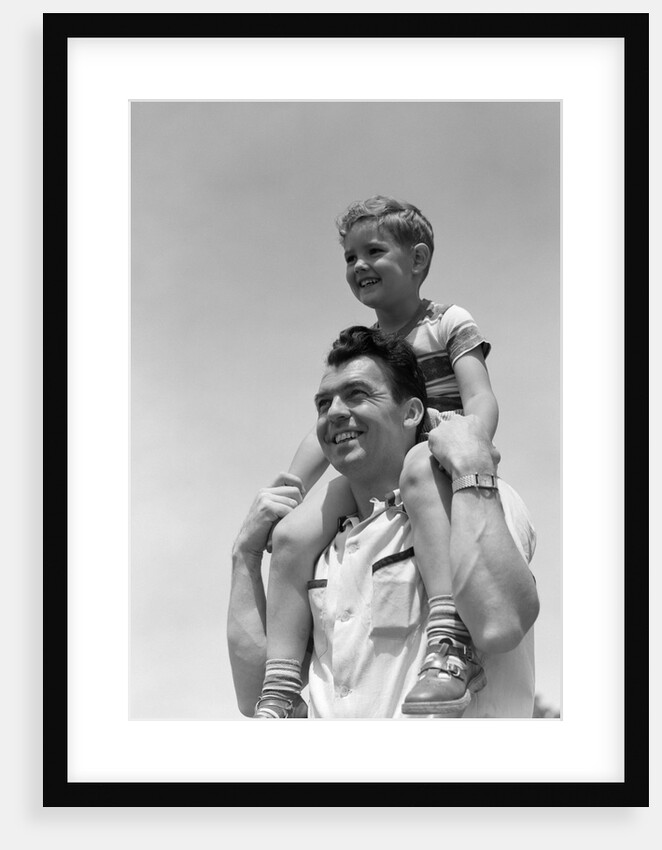 1950s Father Carrying Son On Shoulders Outdoor by Anonymous