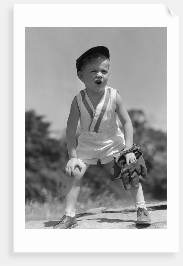 1930s Boy Wearing Baseball Hat and Glove Bent Over With Hands On Knees Yelling by Anonymous