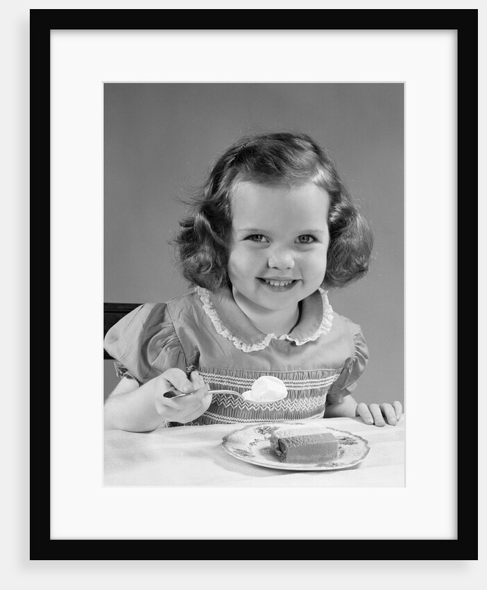 1950s Little Girl Eating Ice Cream by Anonymous