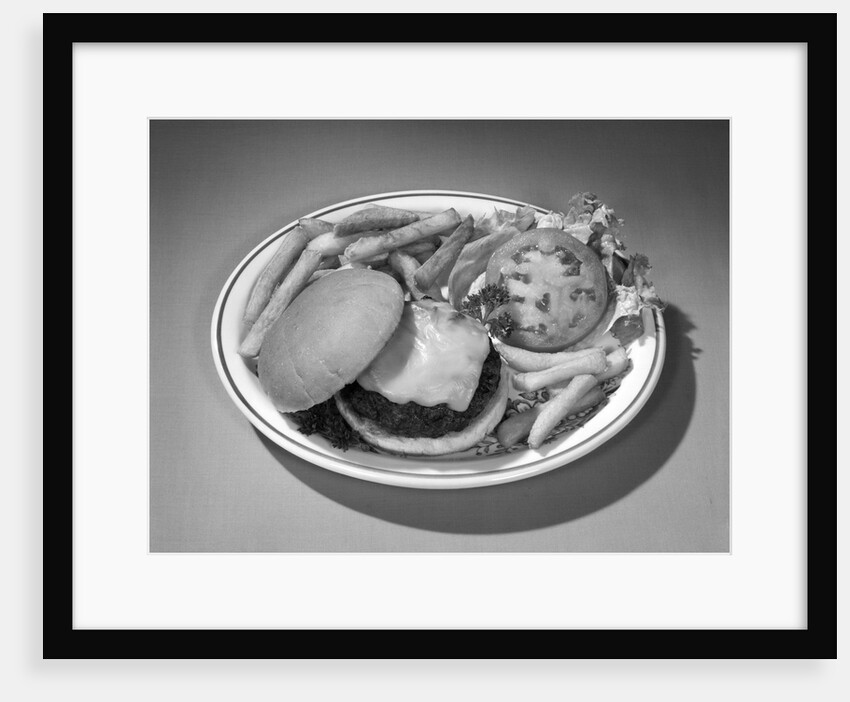 1950s 1960s Cheeseburger Deluxe On Plate French Fries Lettuce by Anonymous