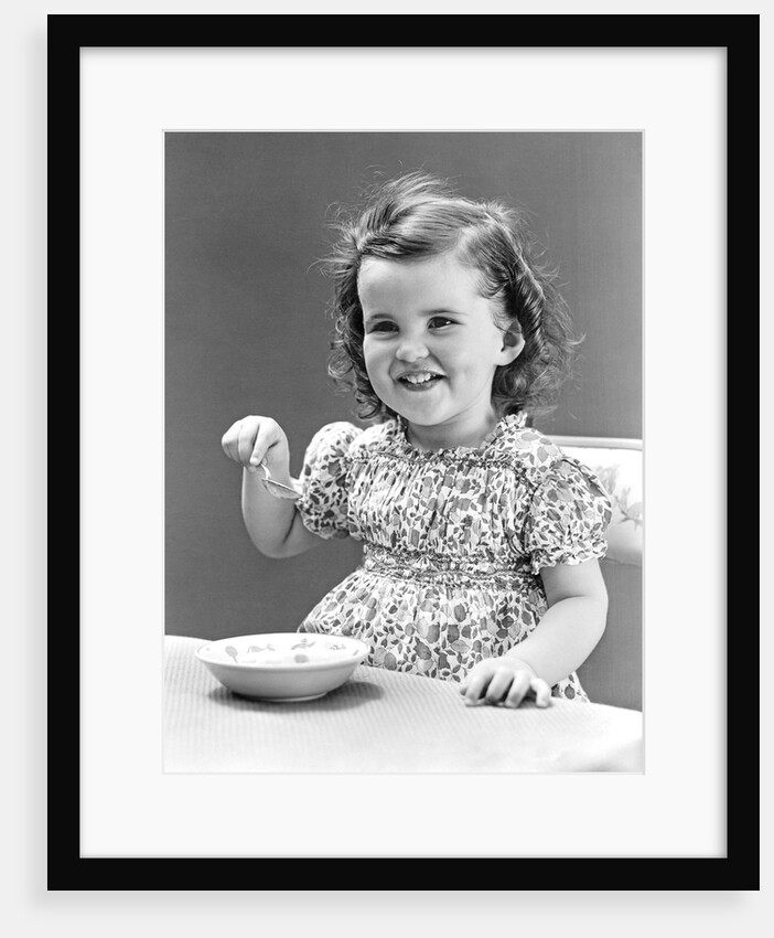 1940s 1930s Little Girl Eating Bowl Of Ice Cream by Anonymous