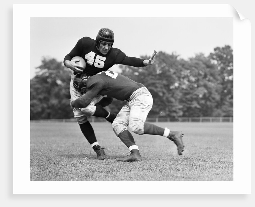 1940s Football Player Being Tackled by Anonymous