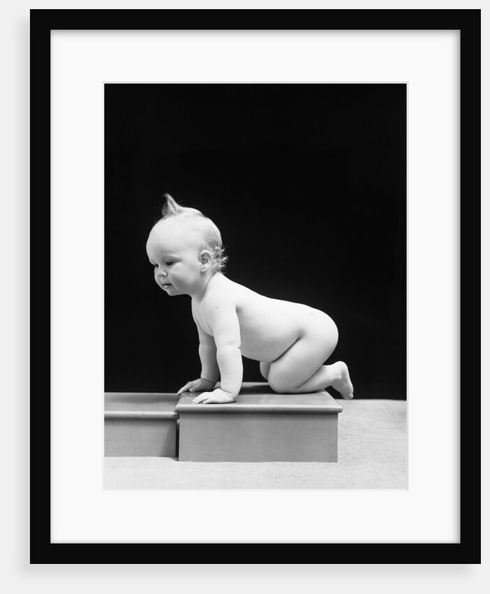 1930s 1940s Naked Baby Crawling On Wooden Box by Anonymous