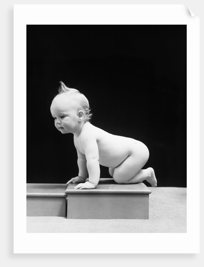 1930s 1940s Naked Baby Crawling On Wooden Box by Anonymous