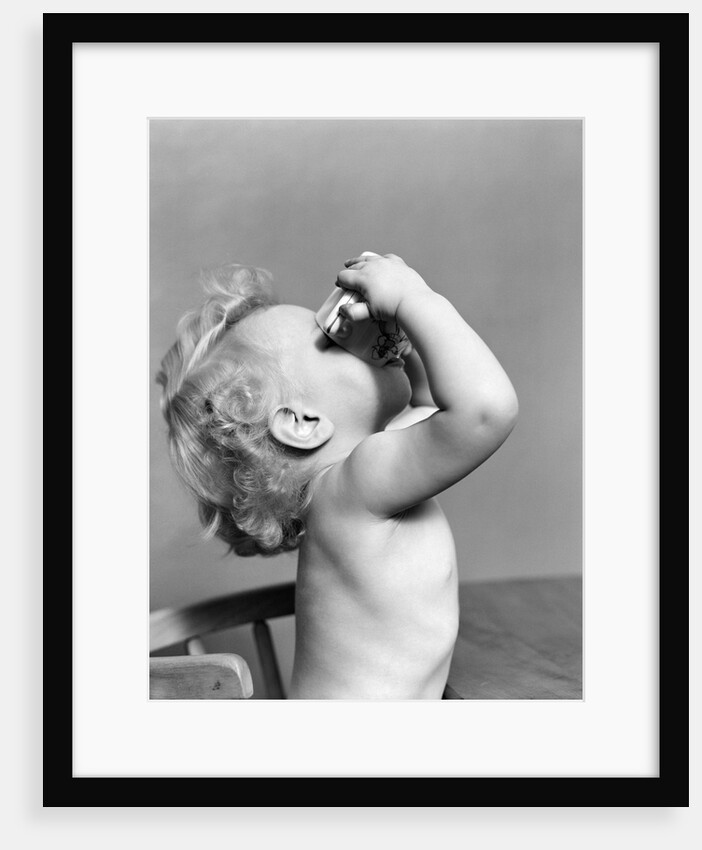 1940s Baby Drinking From Cup by Anonymous