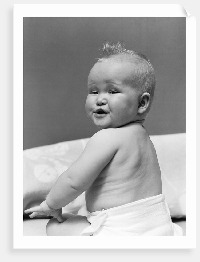 1940s Baby In Diaper Looking Back Over Shoulder With Funny Facial Expression by Anonymous