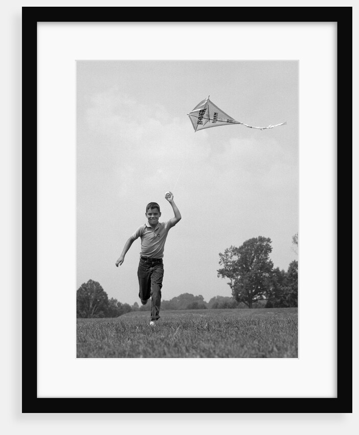 1960s Boy Running Flying Kite by Anonymous