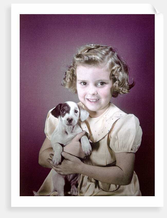 1940s 1950s Girl Holding Spotted Puppy by Anonymous