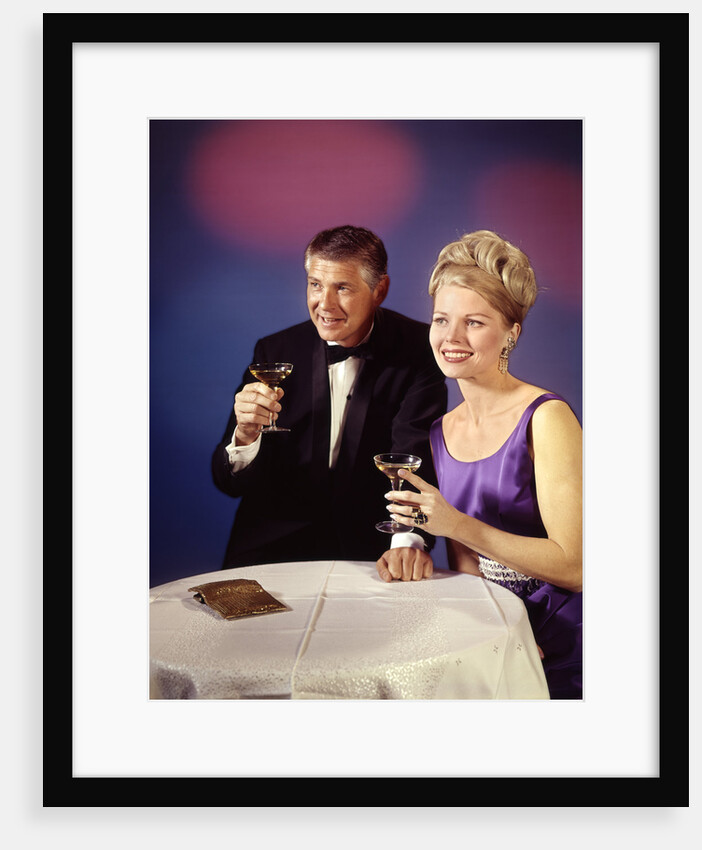 1960s 1970s Couple In Formal Tuxedo And Evening Dress Toasting With Champagne Glasses by Anonymous