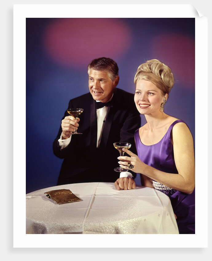 1960s 1970s Couple In Formal Tuxedo And Evening Dress Toasting With Champagne Glasses by Anonymous